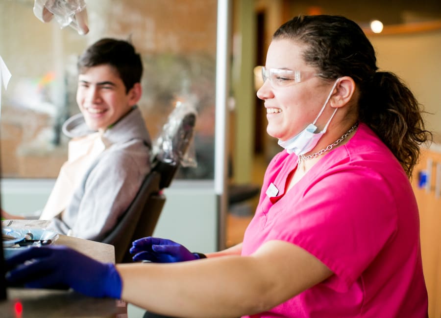 North Seattle Orthodontics team member showing a patient their panoramic X-ray results.